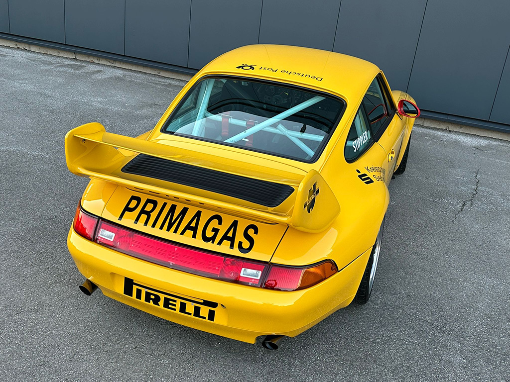 Detail of 993 Cup race car with sponsor decals