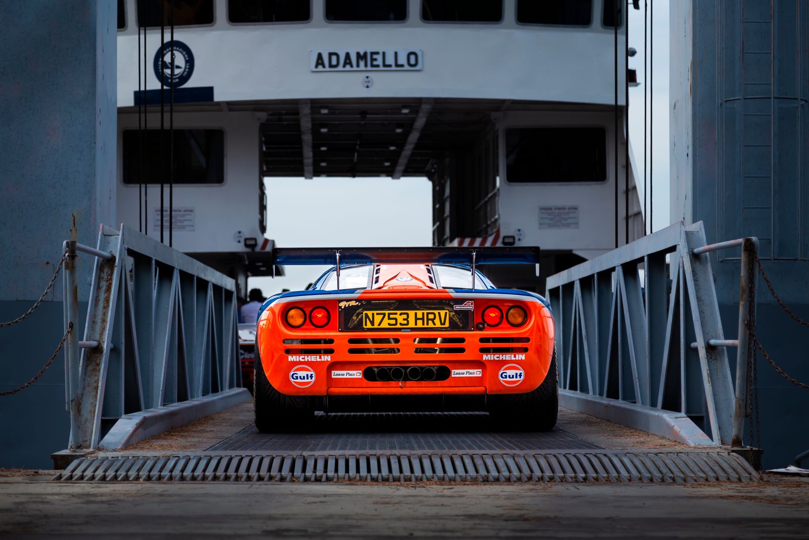 McLaren supercar boarding a ferry in Italy.