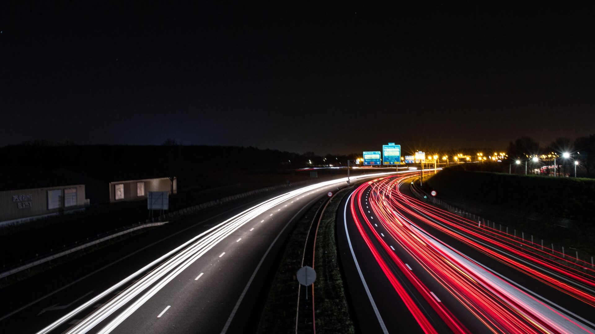Night highway light trails on an overnight run.